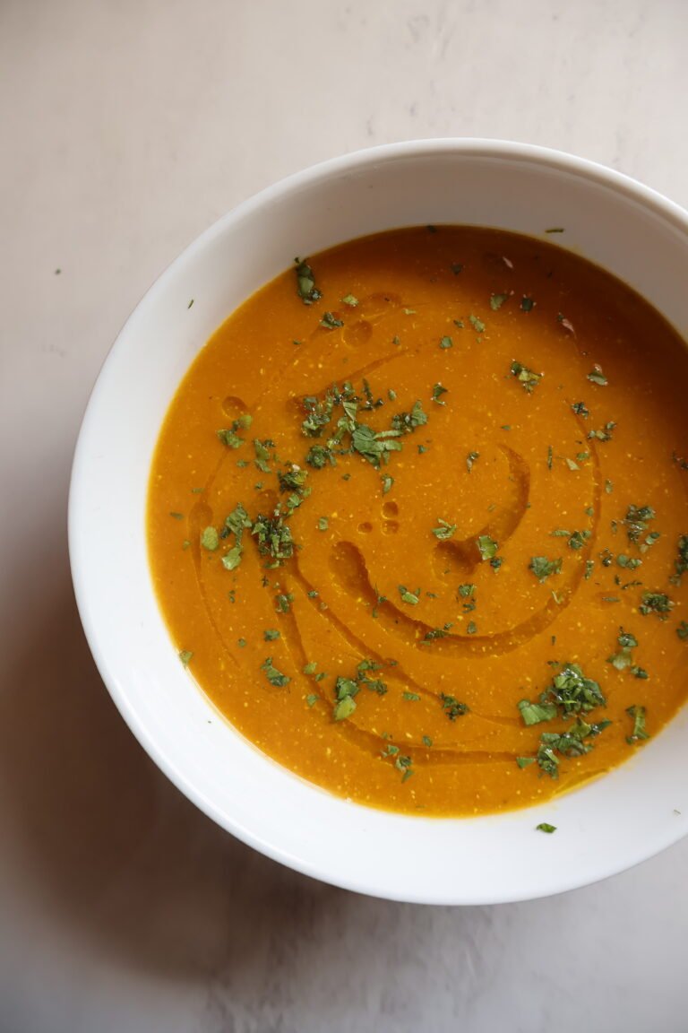 bowl of lentil soup with drizzle of oil