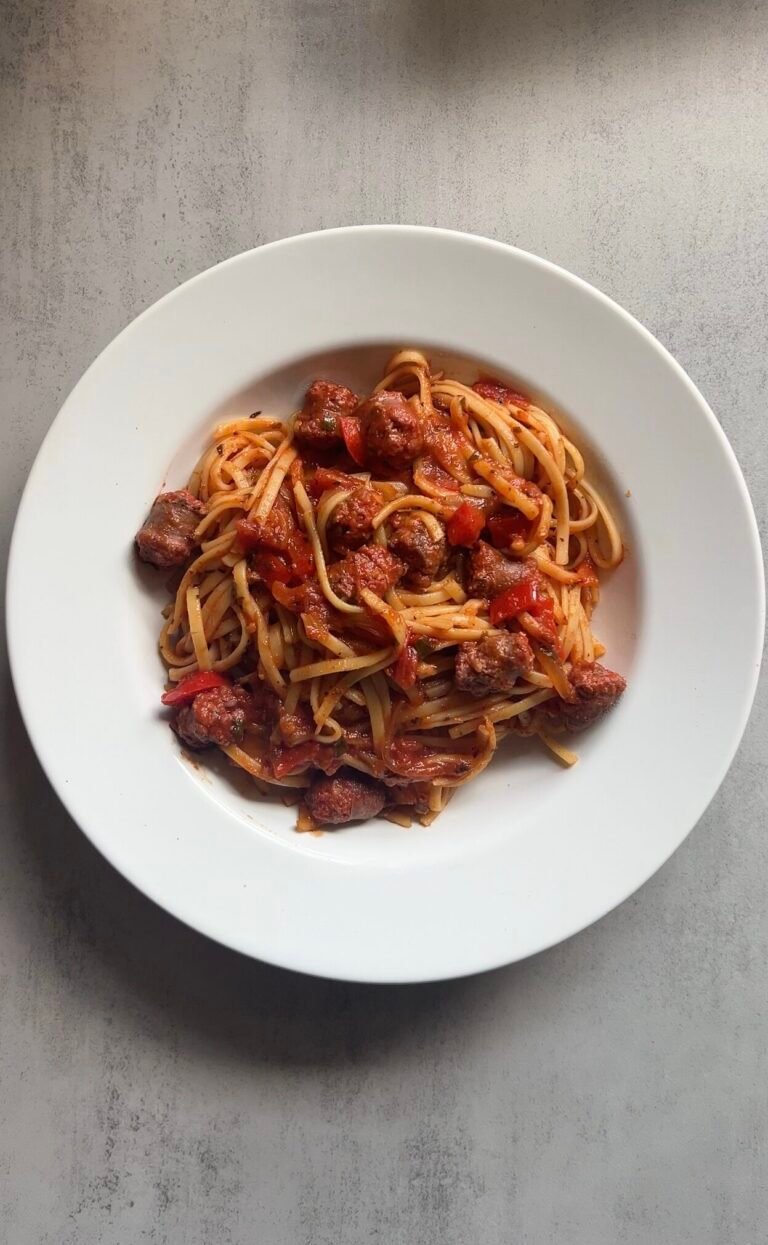 merguez mixed in tomato sauce with linguine